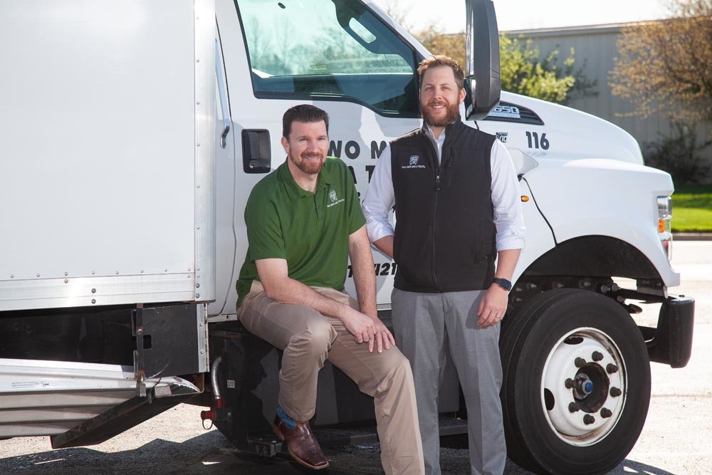 PACK IT IN: Two Men and a Truck franchisees Clint Bergman, left, and Grant Hornbuckle are eyeing new markets.